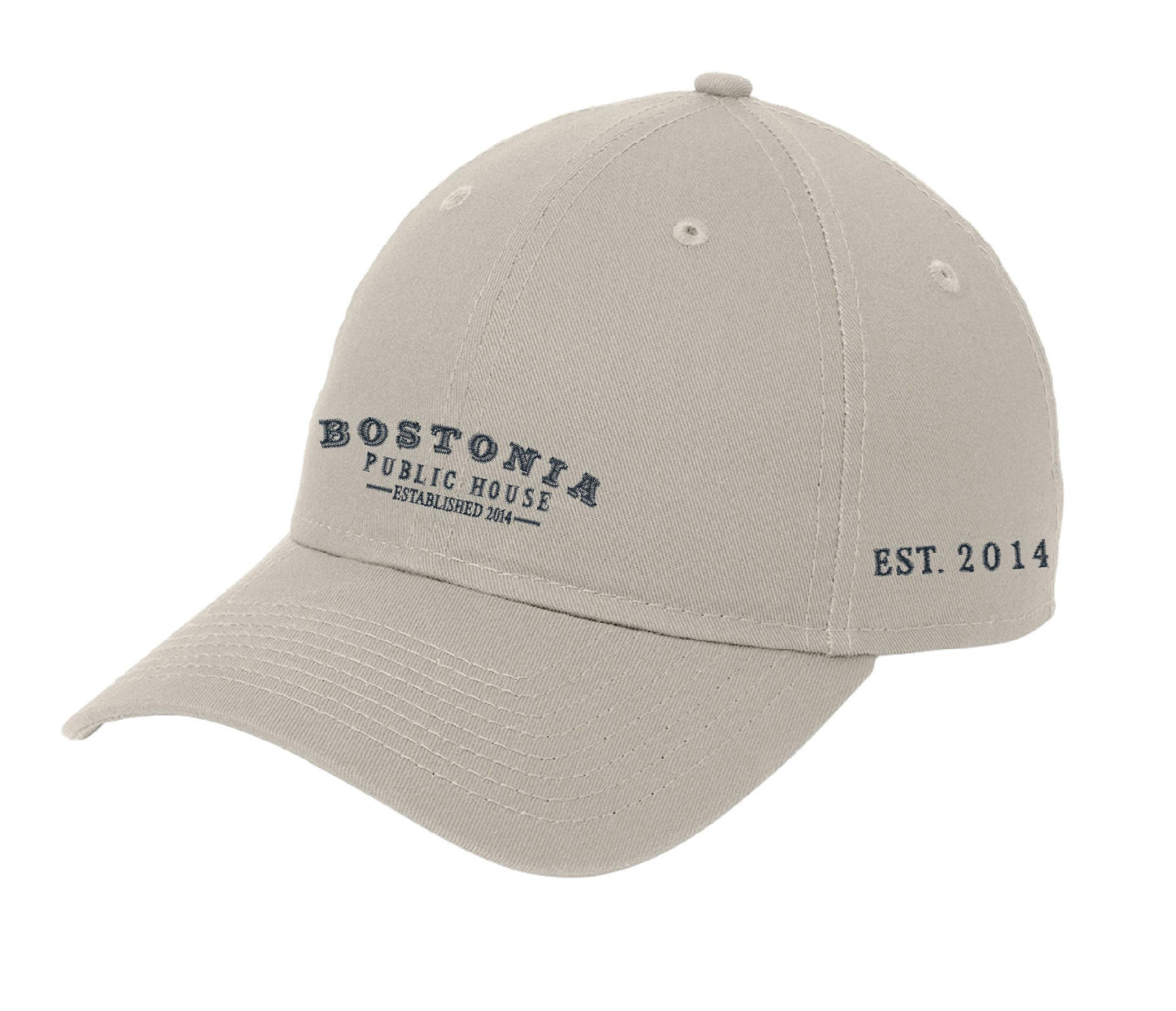 Beige unstructured cotton cap with Bostonia Public House embroidery and precurved visor.