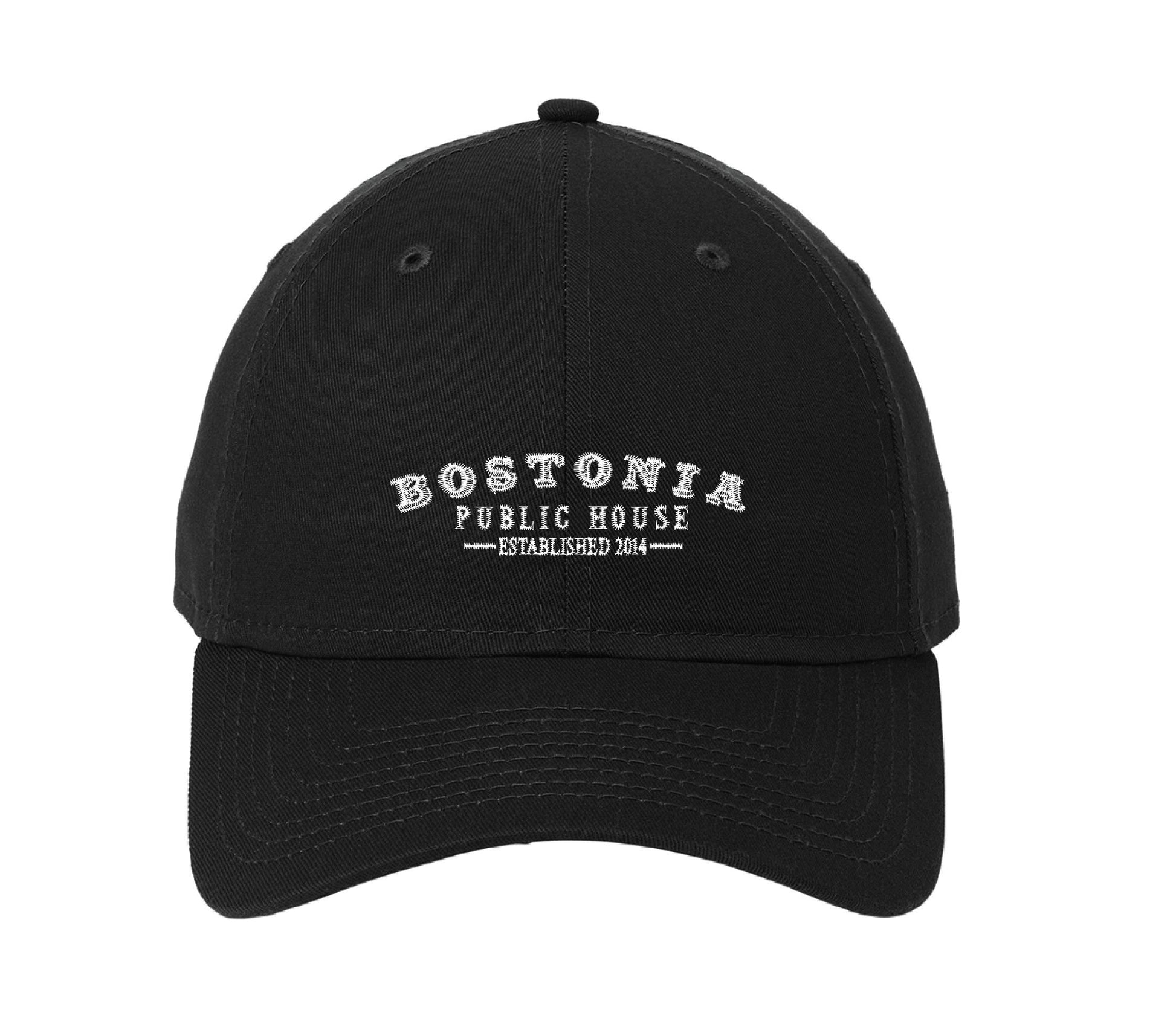 Black unstructured cotton cap with white Bostonia Public House embroidery and a precurved visor.