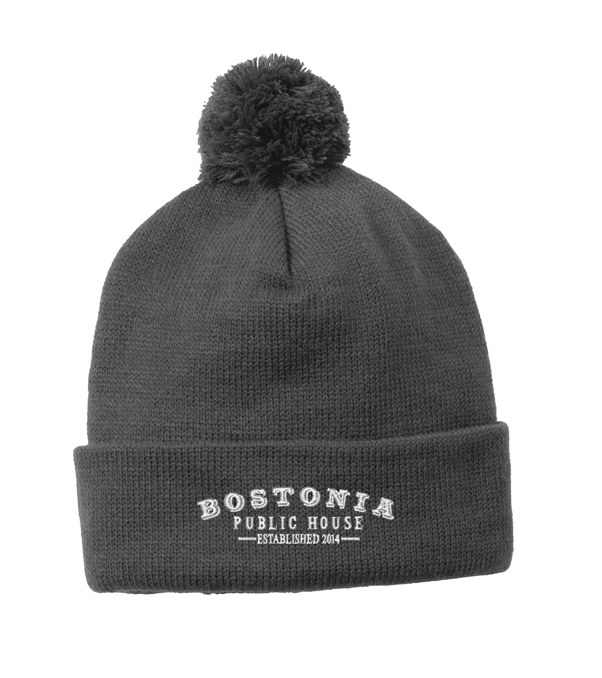 Dark grey acrylic cuff beanie with a matching pom pom and white Bostonia Public House embroidery.
