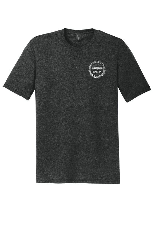 Dark heather grey triblend crewneck tee with a white Bostonia circular chest logo and rib knit neck.