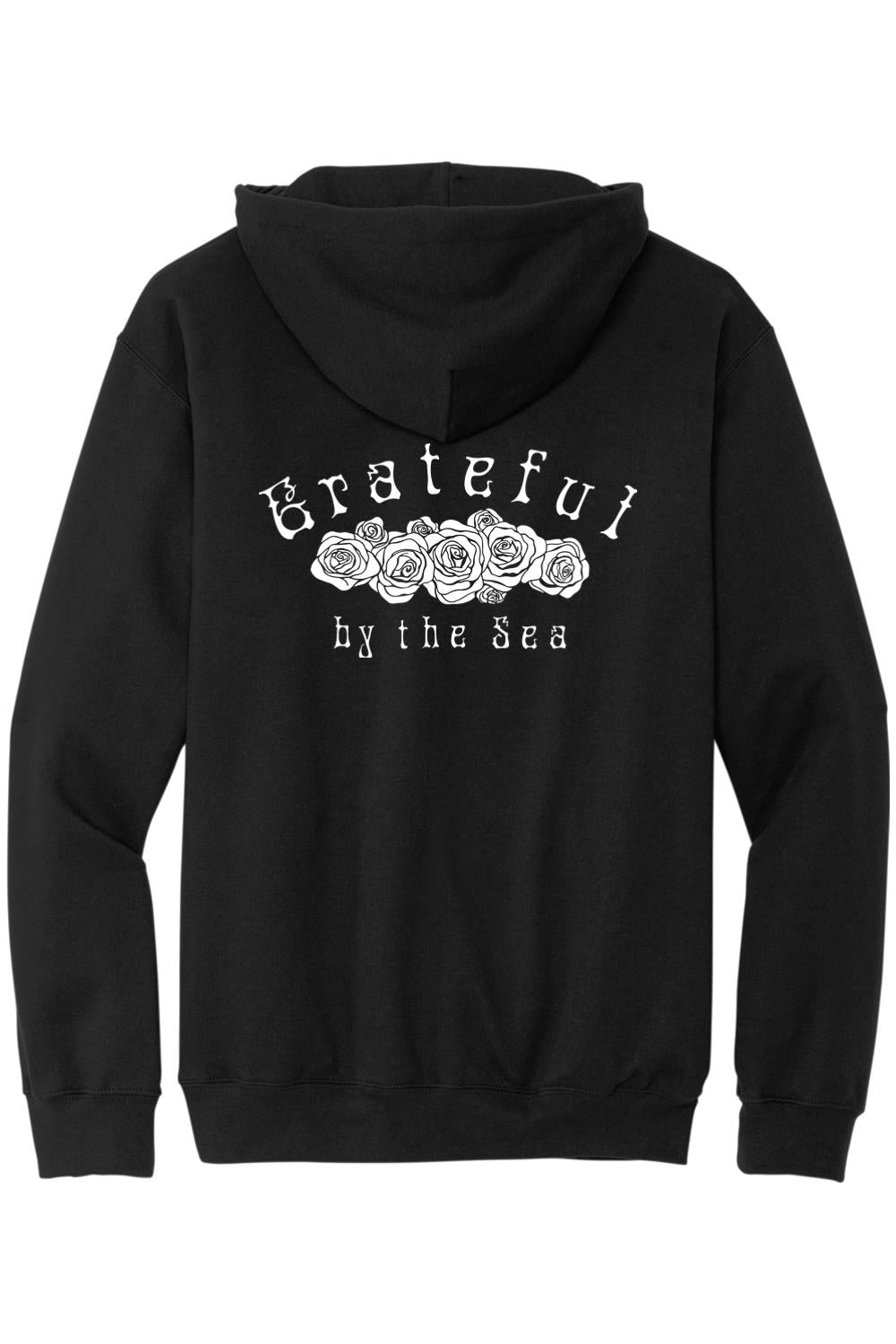 Black zip-up hoodie featuring a white Grateful by the Sea rose graphic on the back.