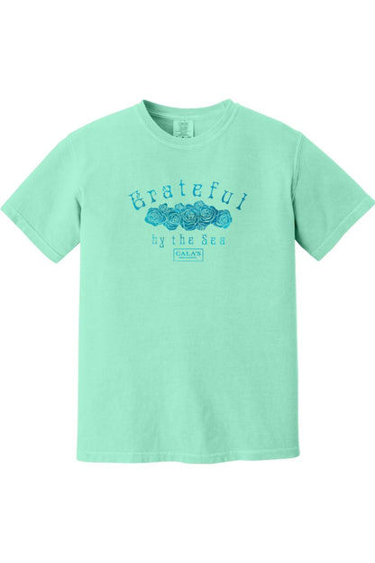 Mint green Comfort Colors unisex t-shirt featuring a blue Grateful By The Sea rose graphic on the chest.