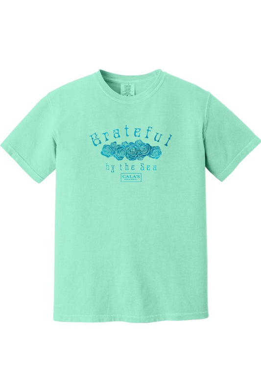 Mint green Comfort Colors unisex t-shirt featuring a blue Grateful By The Sea rose graphic on the chest.