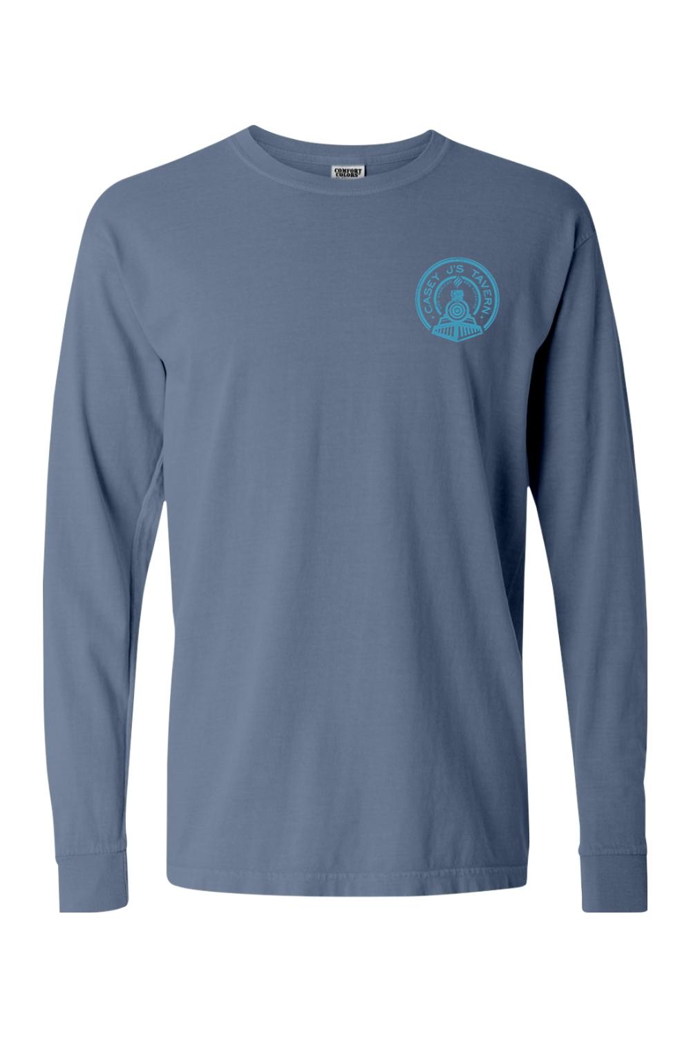 Blue Comfort Colors long-sleeve t-shirt featuring a small circular Casey J's Tavern train logo on the chest.