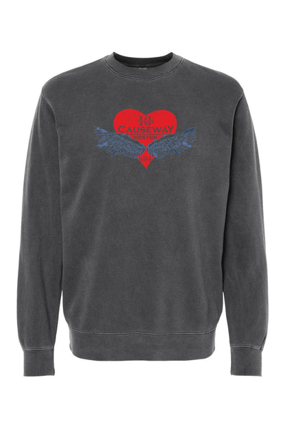 Charcoal pigment-dyed crewneck sweatshirt featuring a red heart, blue wings, and Causeway 10th anniversary graphic.