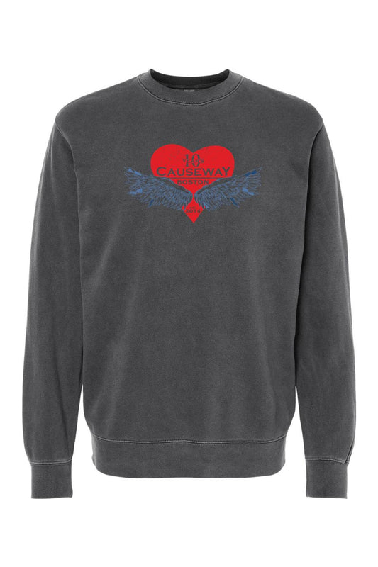 Charcoal pigment-dyed crewneck sweatshirt featuring a red heart, blue wings, and Causeway 10th anniversary graphic.
