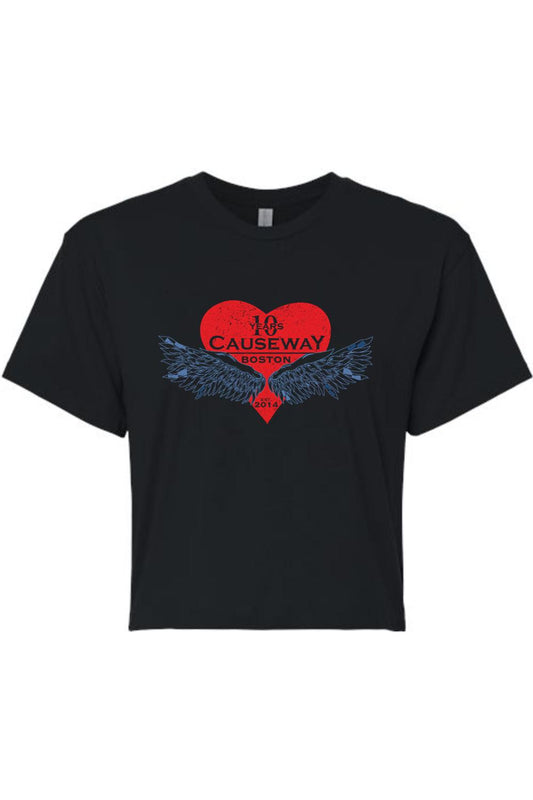 Black women's crop top featuring a red heart graphic with blue wings and Causeway 10th Anniversary text.