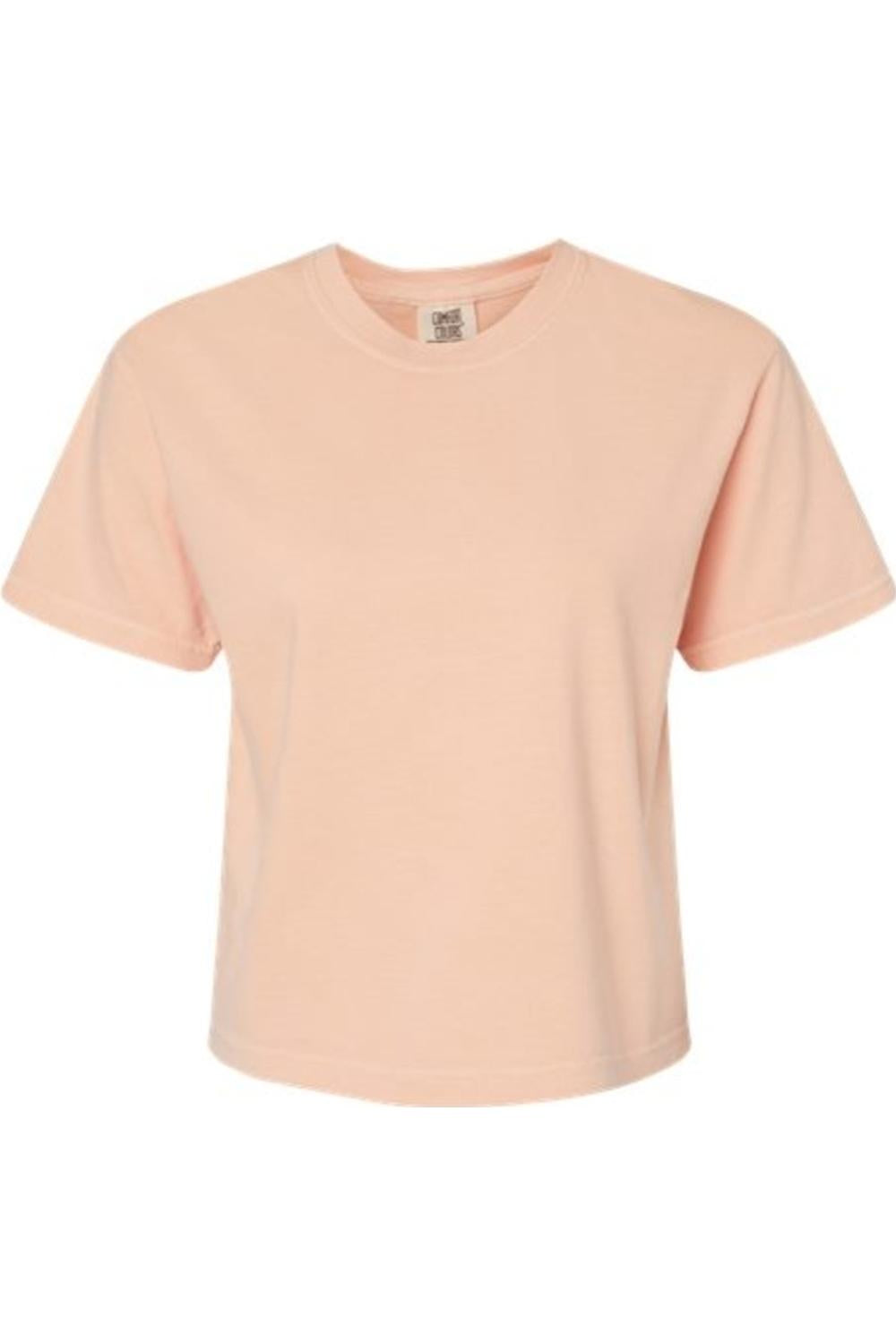 Peach-colored Comfort Colors heavyweight boxy t-shirt in garment-dyed cotton with a classic ribbed crew neck.