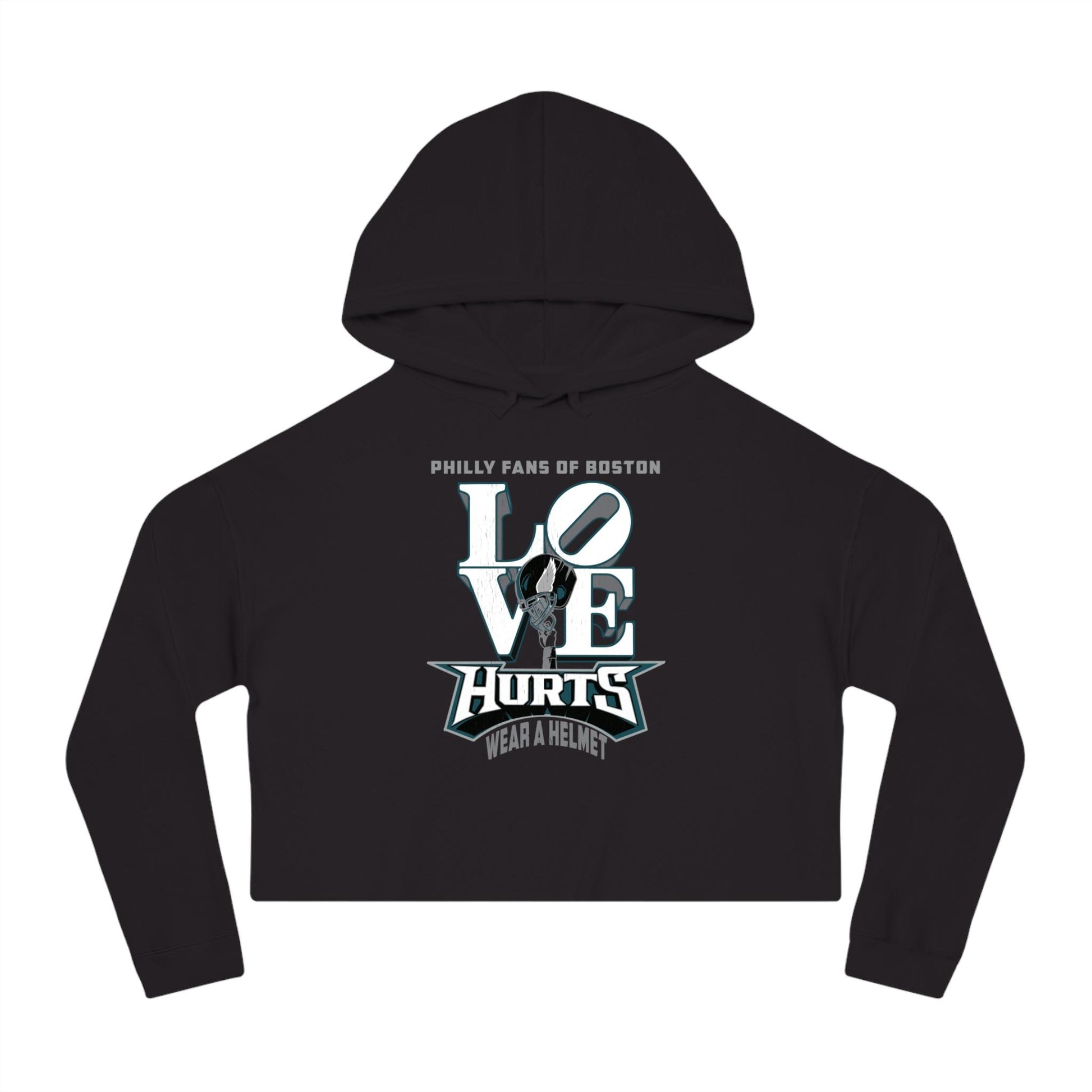 Black crop graphic hoodie featuring Love Hurts text and a football helmet design on soft cotton-blend fleece.