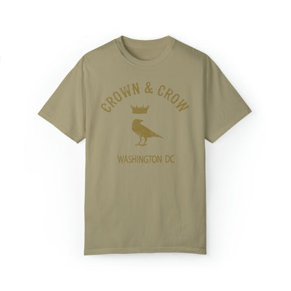 Olive green heavy cotton relaxed-fit T-shirt featuring a gold Crown & Crow Washington DC logo graphic.
