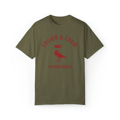 Olive green relaxed-fit cotton t-shirt featuring a distressed red Crown & Crow logo with a bird graphic.