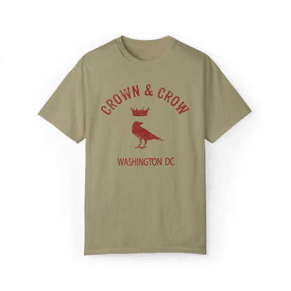 Relaxed fit olive green garment-dyed cotton t-shirt featuring a distressed red Crown & Crow Washington DC logo.