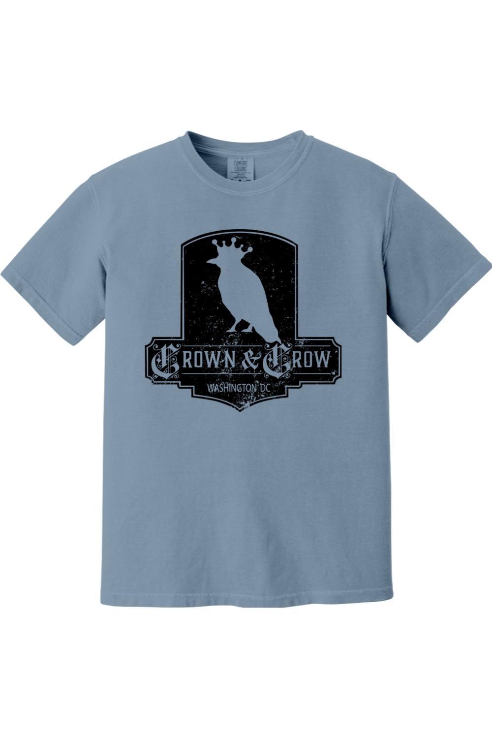 Blue garment-dyed cotton t-shirt with a black distressed Crown & Crow Washington DC graphic print.
