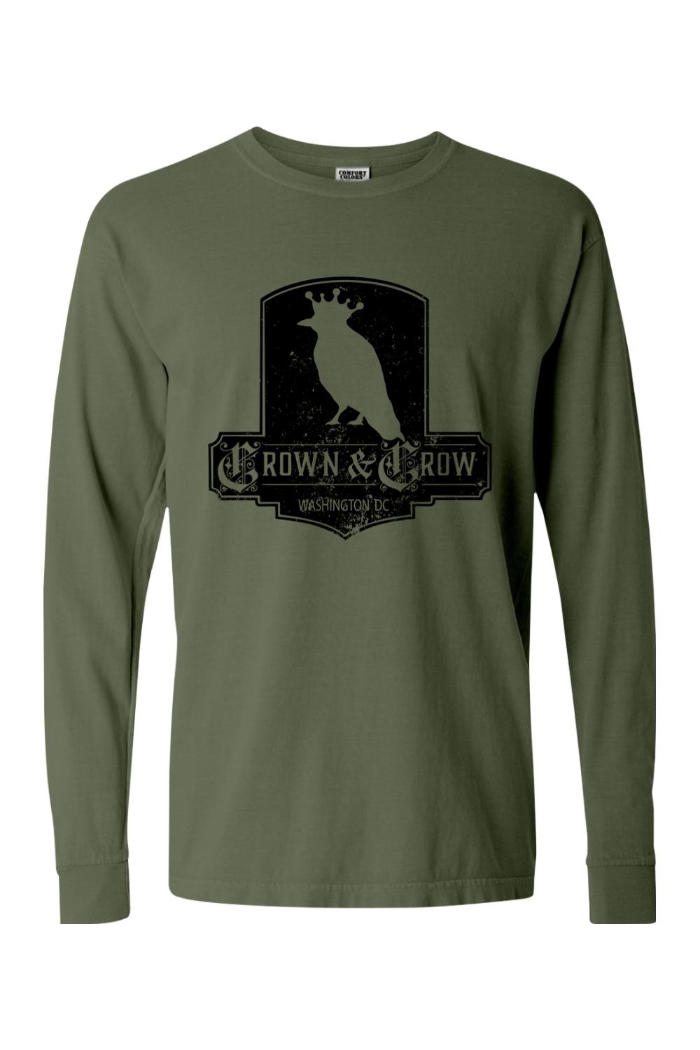 Olive green garment-dyed long sleeve t-shirt with a black distressed Crown & Crow graphic on the chest.
