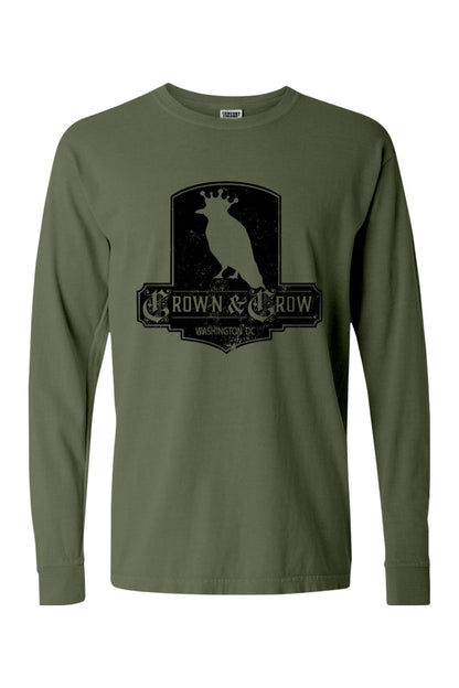 Olive green garment-dyed long sleeve t-shirt with a black distressed Crown & Crow graphic on the chest.