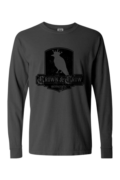 Black garment-dyed long sleeve t-shirt featuring a distressed Crown & Crow logo graphic on the chest.
