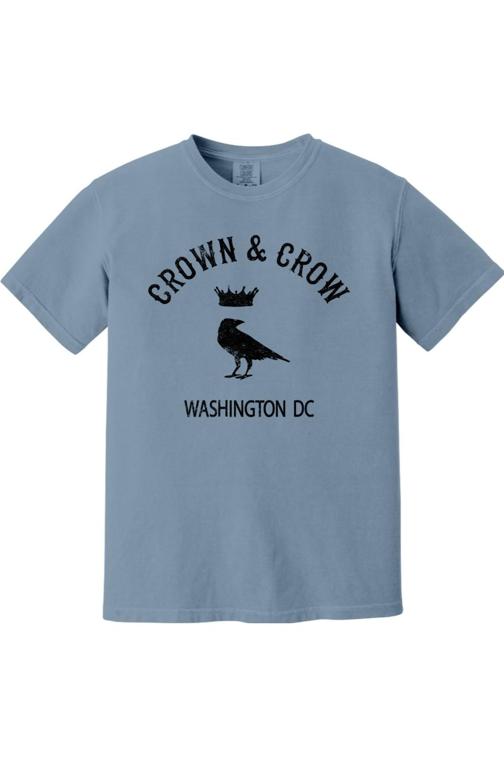 Blue garment-dyed unisex t-shirt featuring a black Crown & Crow logo with a crow and crown graphic and Washington DC text.
