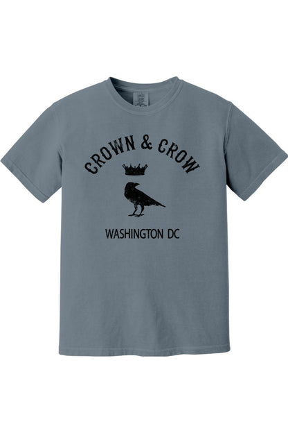 Black garment-dyed unisex t-shirt featuring a Crown & Crow graphic with a bird and Washington DC text.