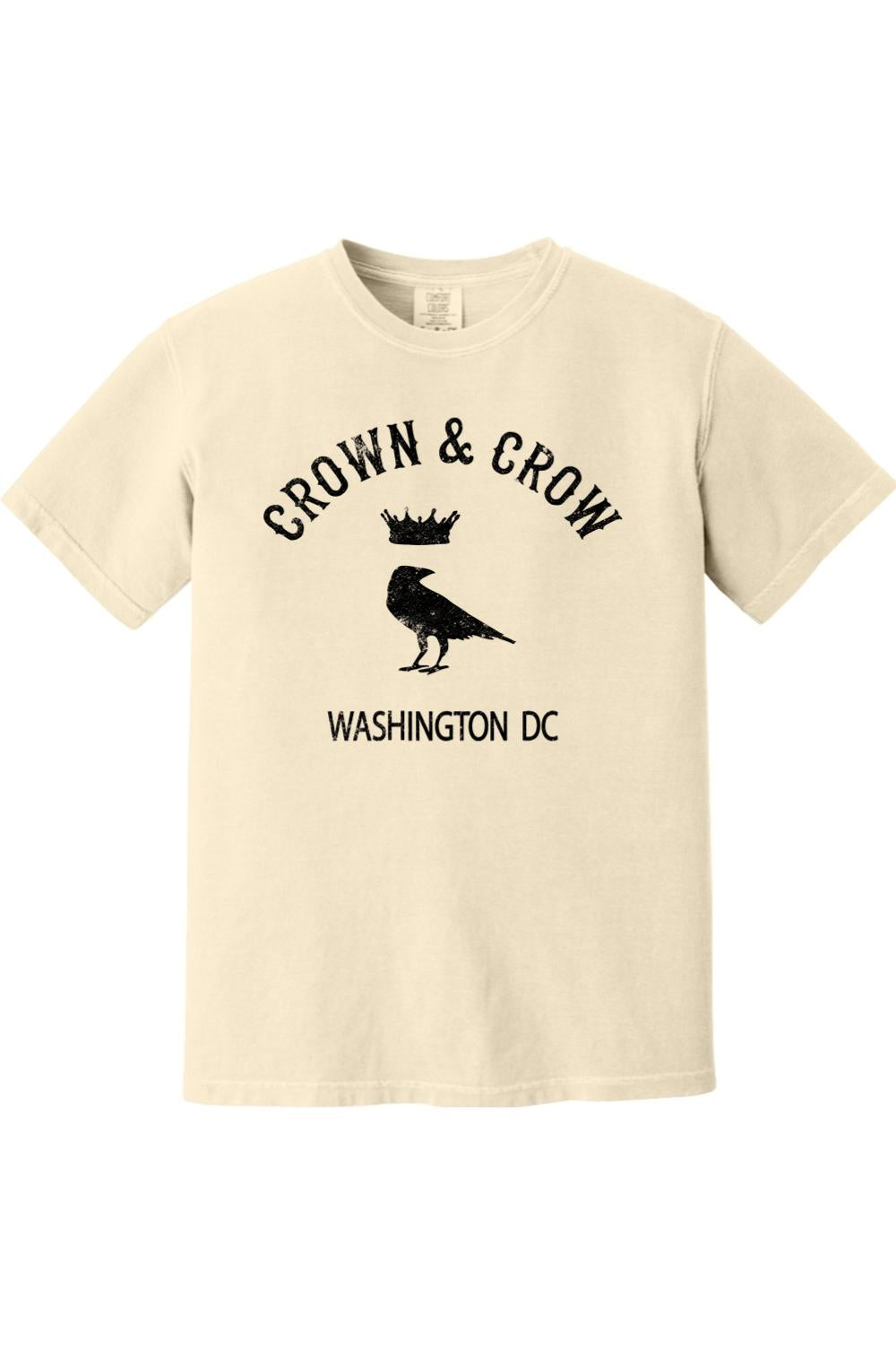 Cream-colored unisex garment-dyed cotton t-shirt featuring a black Crown & Crow logo with a crow and Washington DC text.