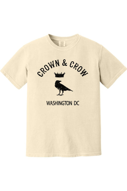 Cream-colored unisex garment-dyed cotton t-shirt featuring a black Crown & Crow logo with a crow and Washington DC text.