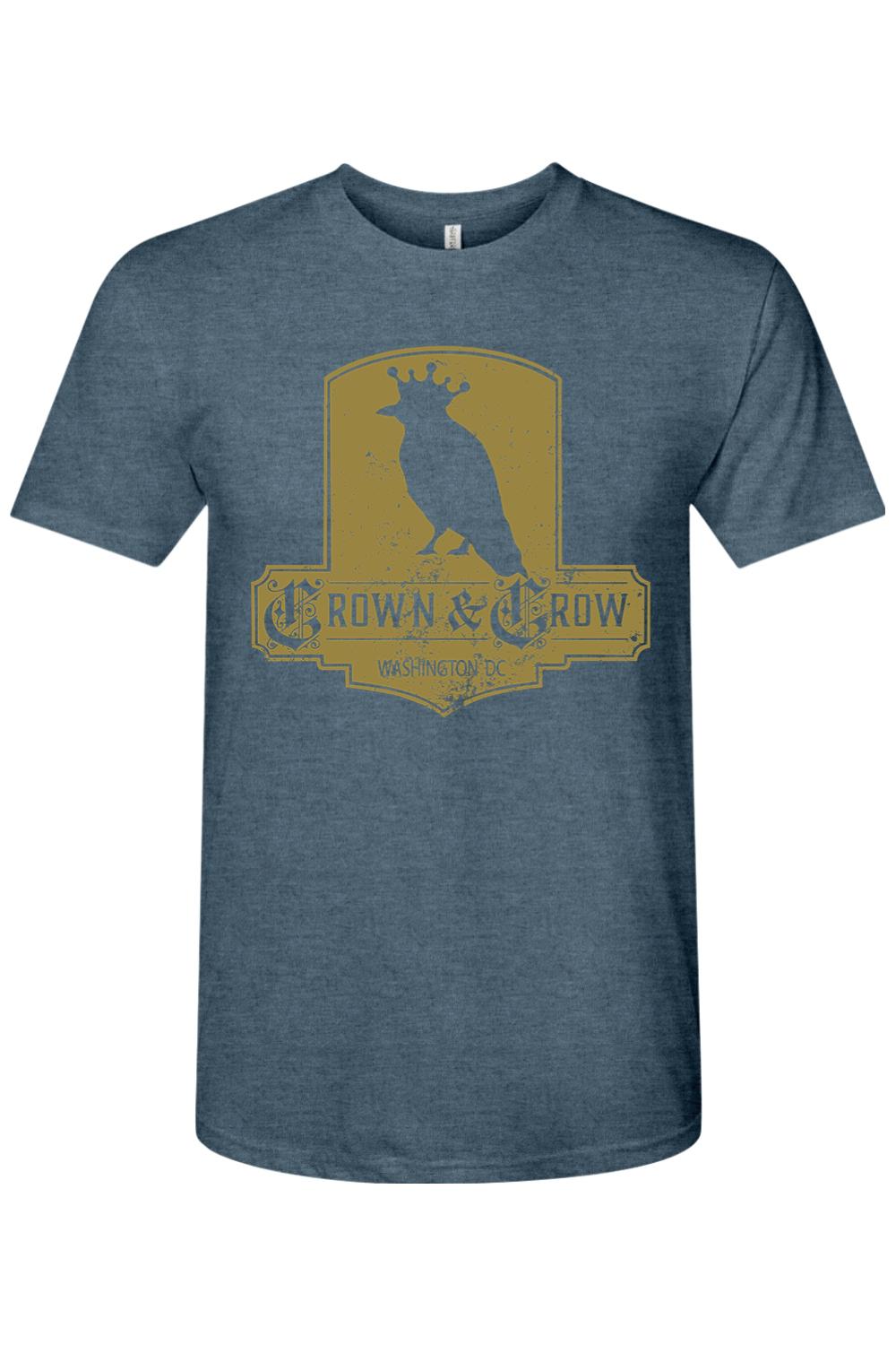 Blue heathered tri-blend crew neck t-shirt featuring a distressed gold Crown & Crow logo graphic.