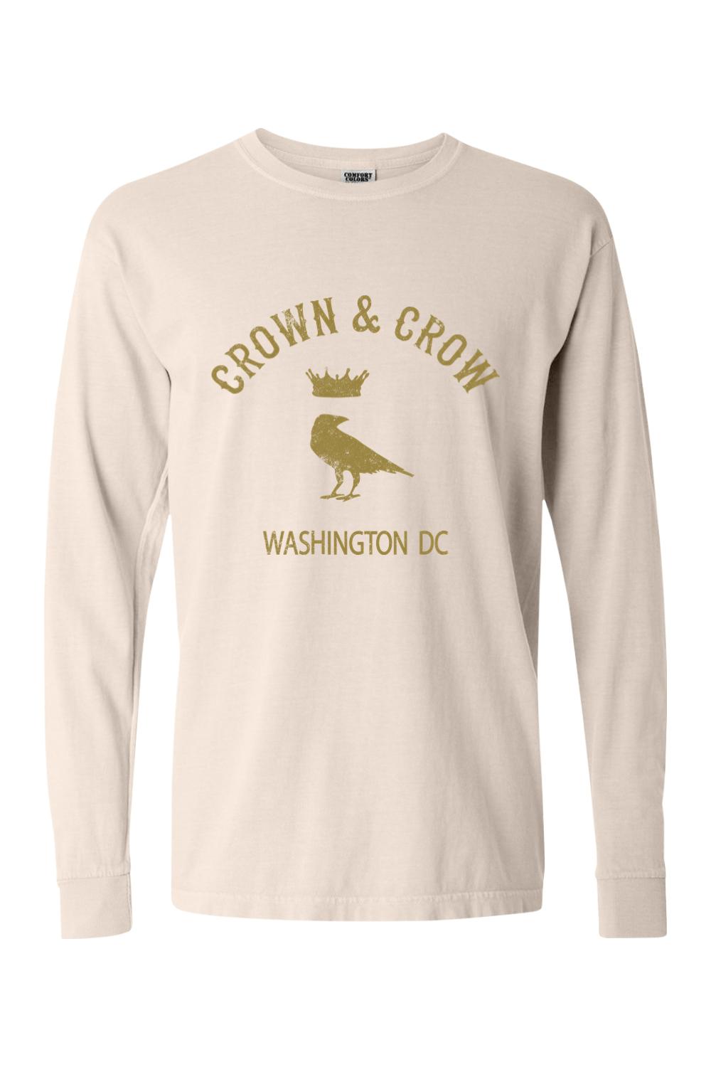 Gold Crown & Crow graphic on a beige, garment-dyed 100% cotton long sleeve unisex t-shirt.