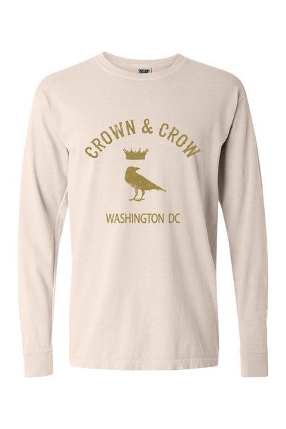 Gold Crown & Crow graphic on a beige, garment-dyed 100% cotton long sleeve unisex t-shirt.
