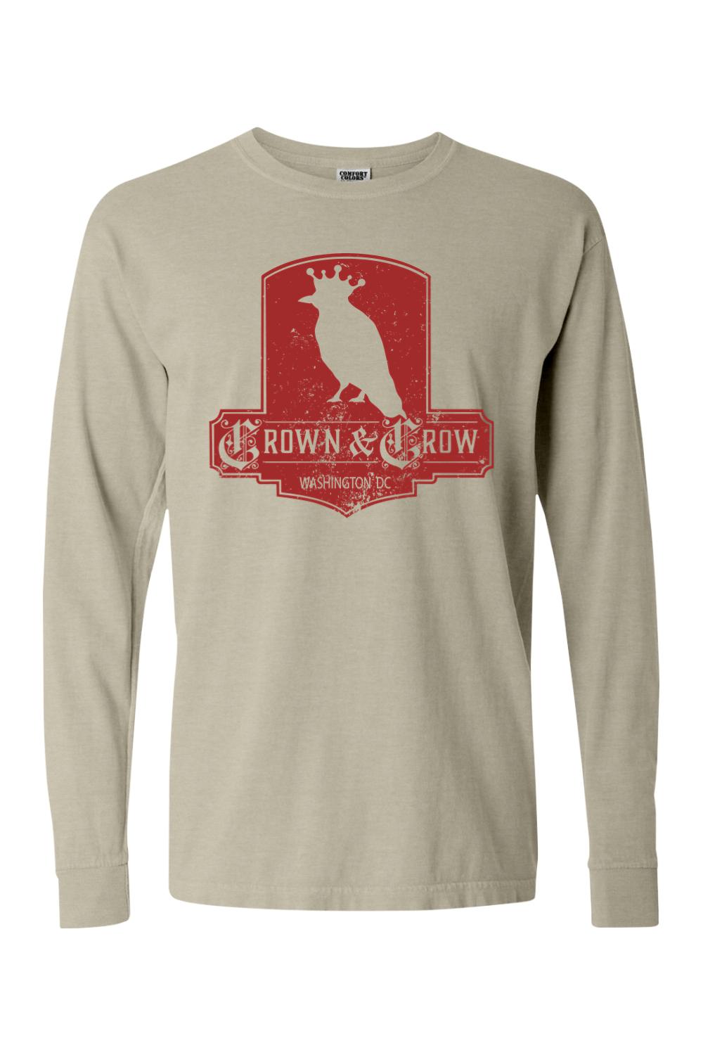 Beige garment-dyed long sleeve cotton t-shirt with a red distressed Crown & Crow Washington DC graphic print.