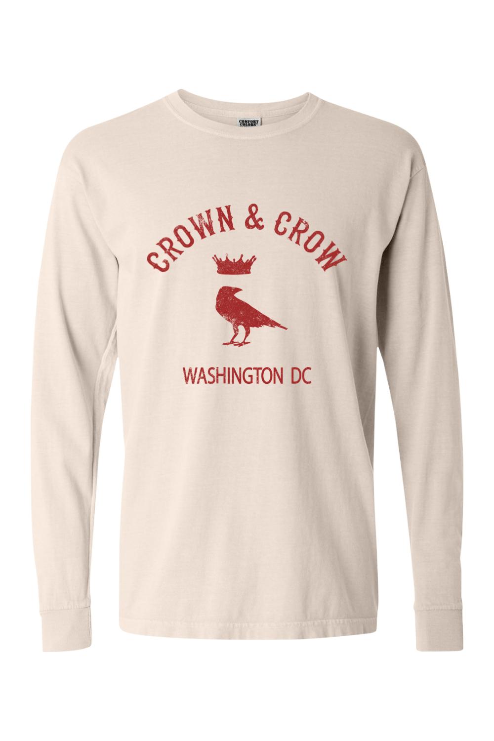 Beige garment-dyed long sleeve t-shirt featuring a red Crown & Crow graphic with Washington DC text.