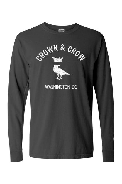 Charcoal grey garment-dyed long sleeve cotton t-shirt with white Crown & Crow Washington DC crow logo graphic.