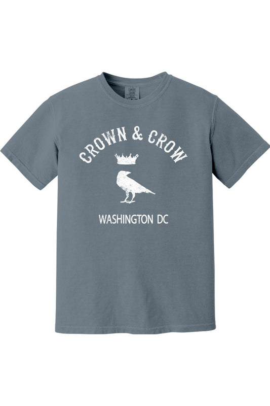 Blue-grey garment-dyed unisex t-shirt featuring a white Crown & Crow logo with a crow and crown graphic and Washington DC text.
