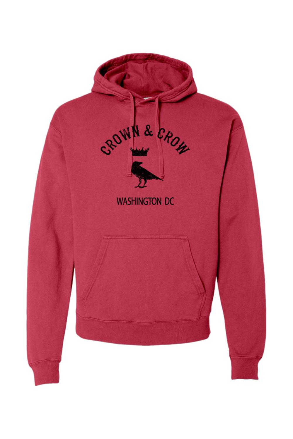 Red garment-dyed cotton hoodie featuring a black Crown and Crow logo with a raven and Washington DC text.