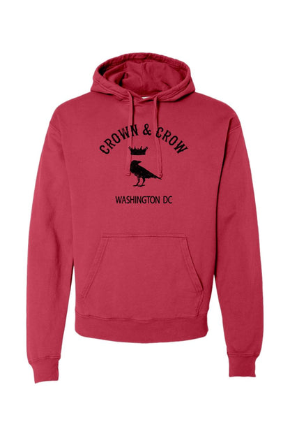 Red garment-dyed cotton hoodie featuring a black Crown and Crow logo with a raven and Washington DC text.