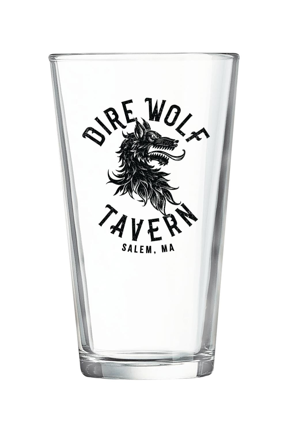 Clear 16 oz. pint glass featuring a black Dire Wolf Tavern Salem, MA logo on the front.