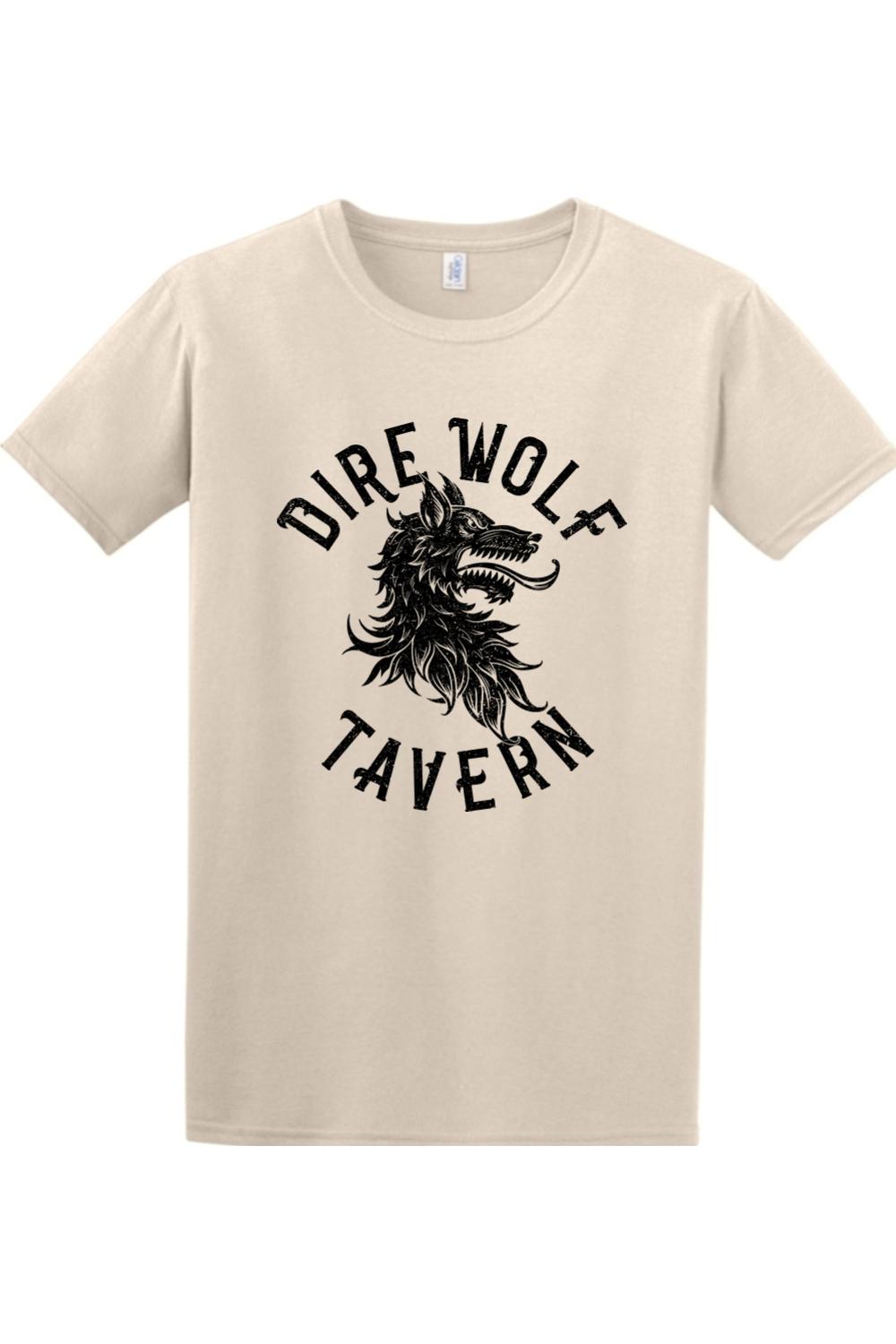 Soft beige cotton t-shirt featuring a black Dire Wolf Tavern graphic logo on the chest.