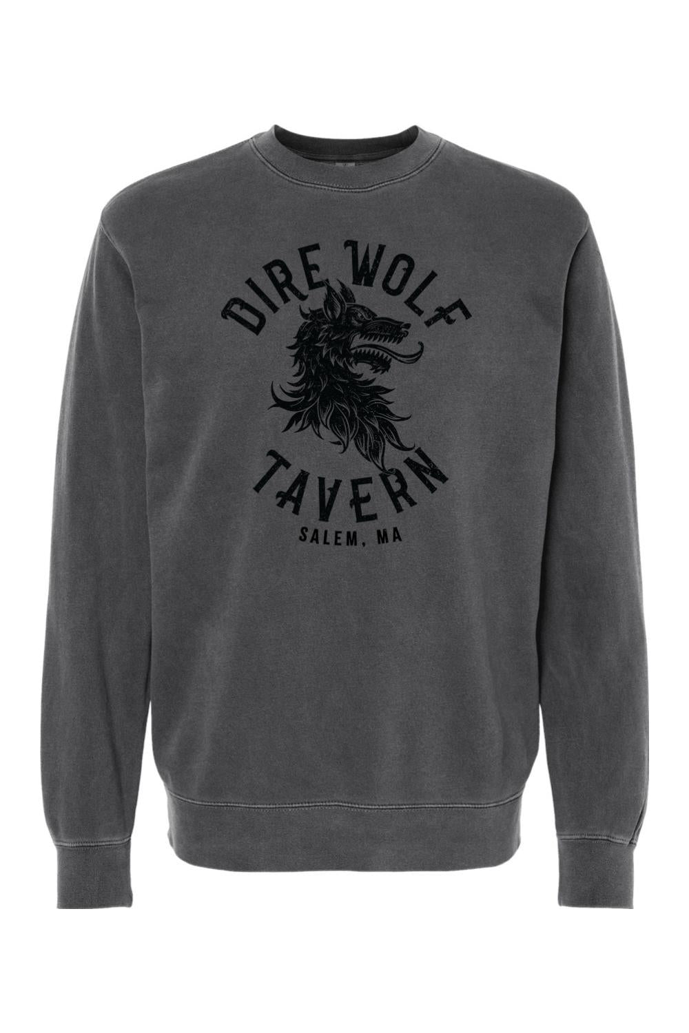 Charcoal pigment-dyed crewneck sweatshirt featuring a black Dire Wolf Tavern Salem, MA graphic on the chest.