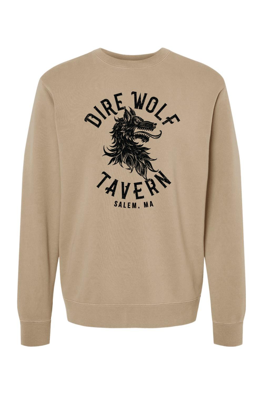 Tan pigment-dyed crewneck sweatshirt featuring a black Dire Wolf Tavern logo graphic on the chest.