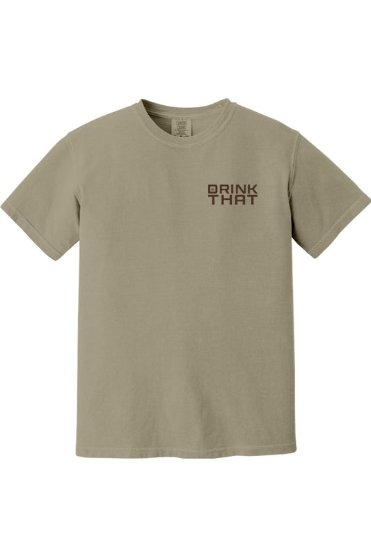 Khaki Comfort Colors ringspun cotton t-shirt featuring a small Drink That logo printed on the left chest.