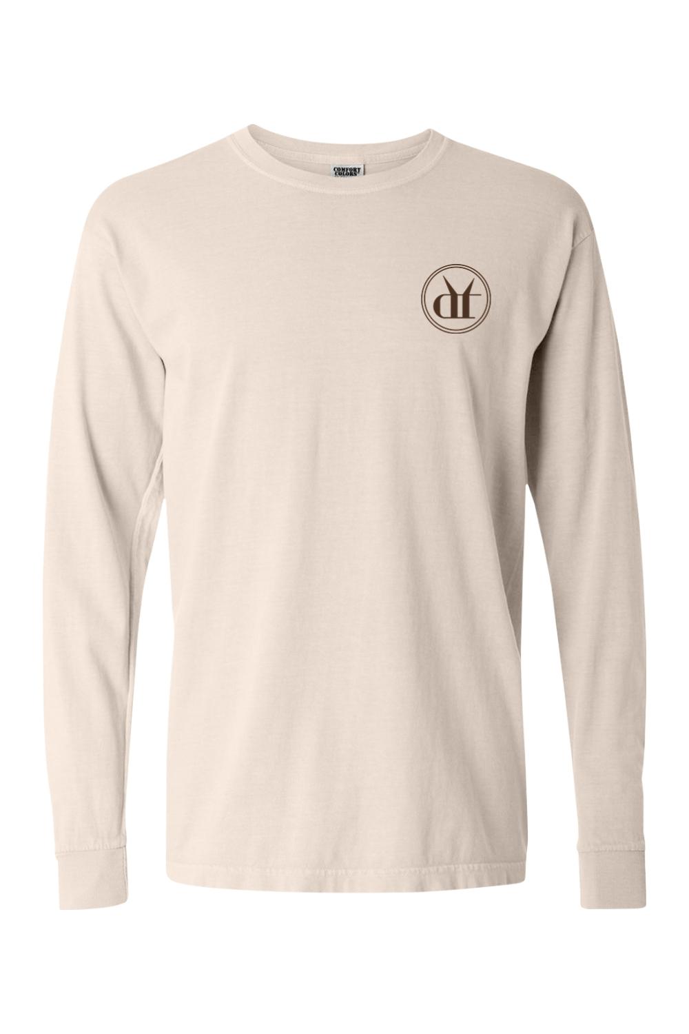 Beige Comfort Colors long sleeve cotton t-shirt featuring a circular Drink That espresso martini logo on the chest.