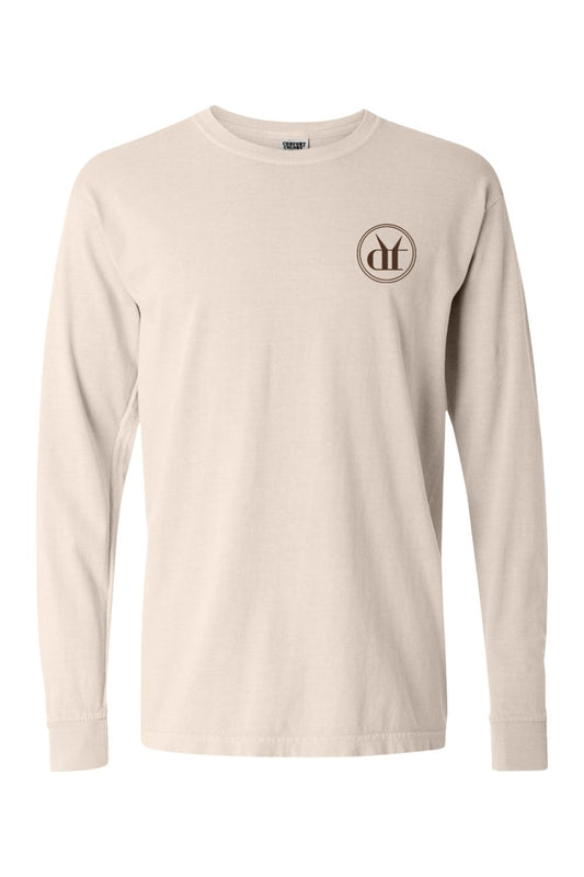 Beige Comfort Colors long sleeve cotton t-shirt featuring a circular Drink That espresso martini logo on the chest.