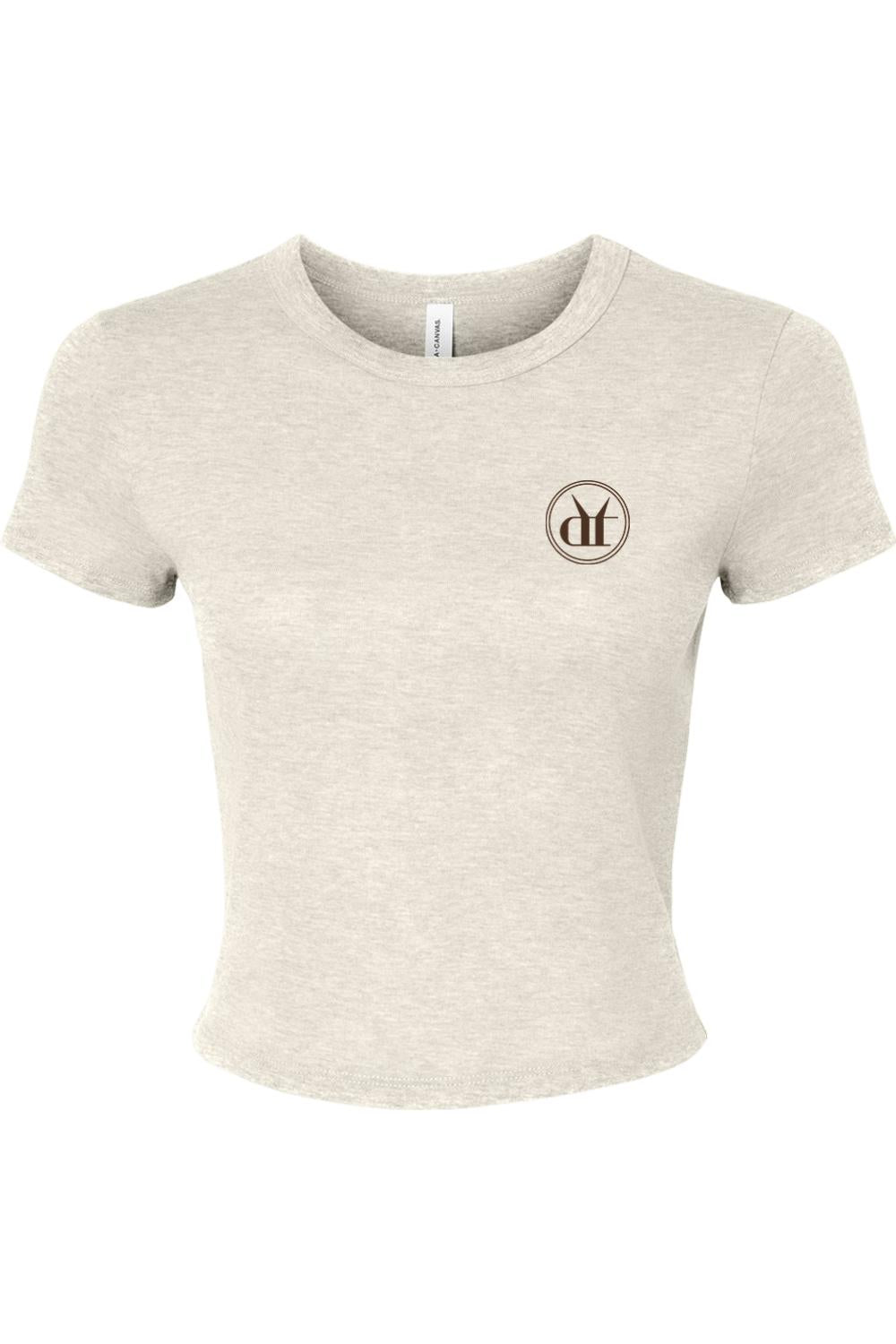 Beige micro rib baby tee with a small circular espresso martini logo on the chest and a fitted, cropped silhouette.
