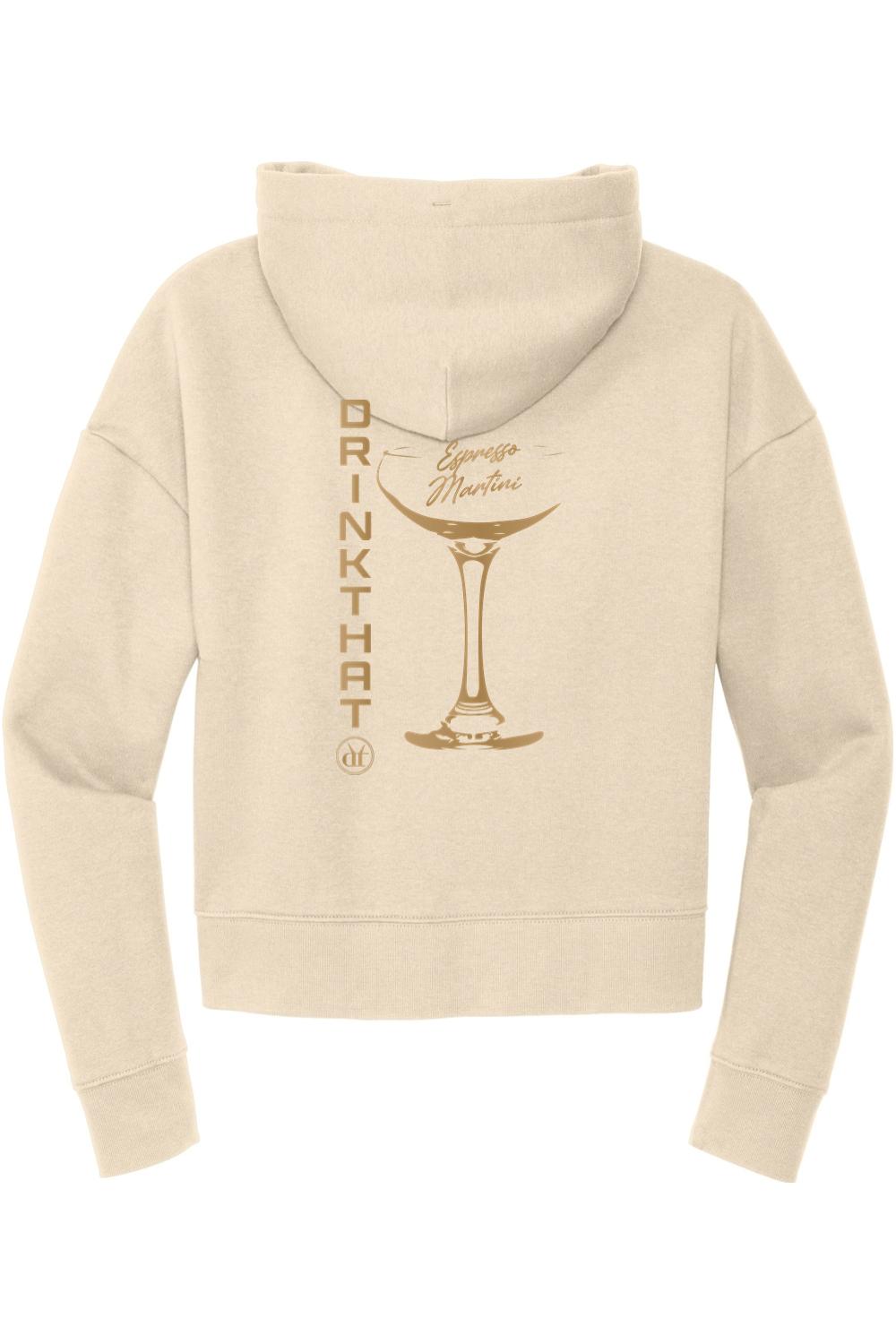 Beige women's hoodie featuring a back graphic of an espresso martini glass and Drink That text in brown.