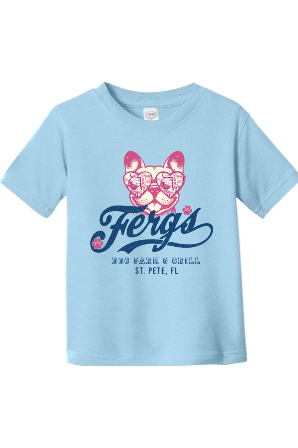 Light blue toddler cotton t-shirt featuring a pink French bulldog wearing heart-shaped sunglasses and Ferg's logo.