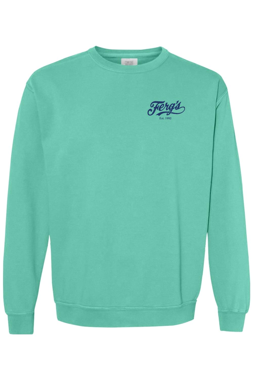 Mint green Comfort Colors crewneck sweatshirt featuring a navy blue Ferg's Tropicana logo on the left chest.