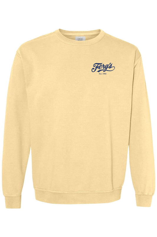 Light yellow Comfort Colors crewneck sweatshirt with a small navy blue Ferg's Est. 1992 logo on the left chest.