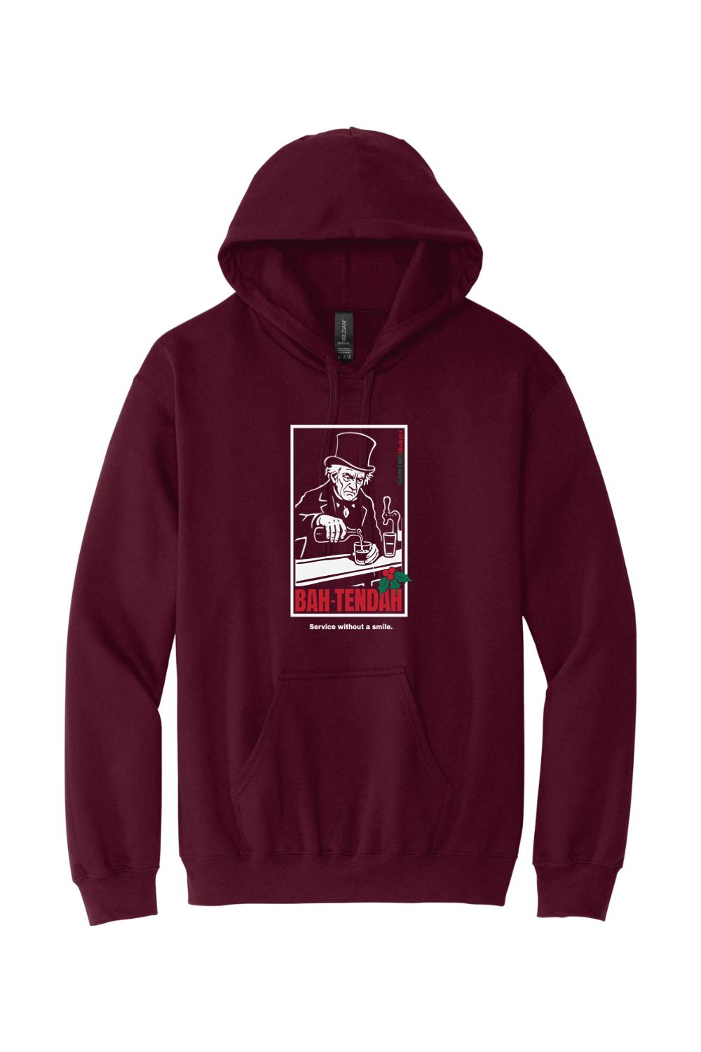 Maroon pullover hoodie featuring a graphic of a grumpy bartender in a top hat with the text BAH-TENDER.
