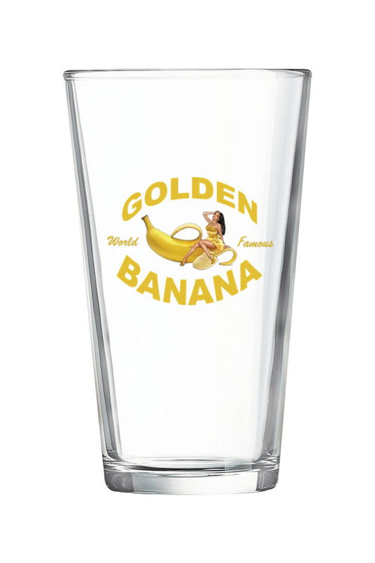 Clear 16 oz. pint glass featuring a Golden Banana logo with a pin-up girl graphic in yellow text.