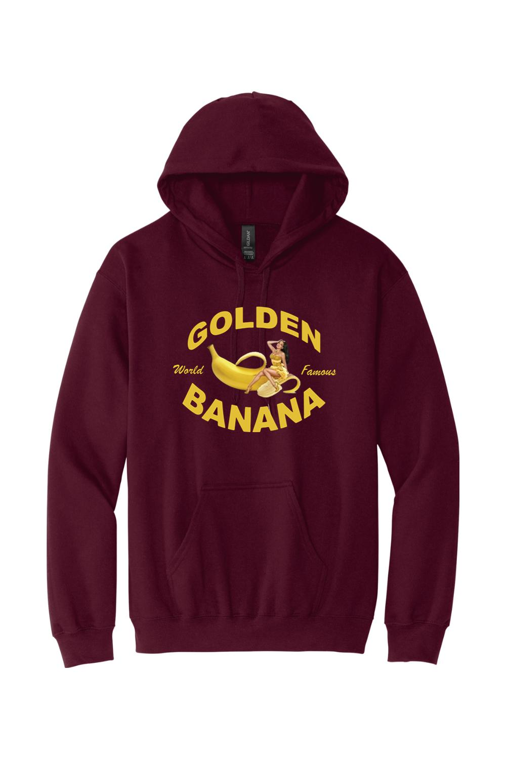 Maroon pullover hoodie featuring a Golden Banana pin-up logo graphic in yellow on the chest with a front kangaroo pocket.