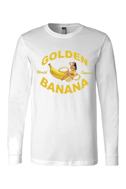 White long-sleeve jersey tee featuring a Golden Banana graphic with a woman sitting on a banana in yellow text.