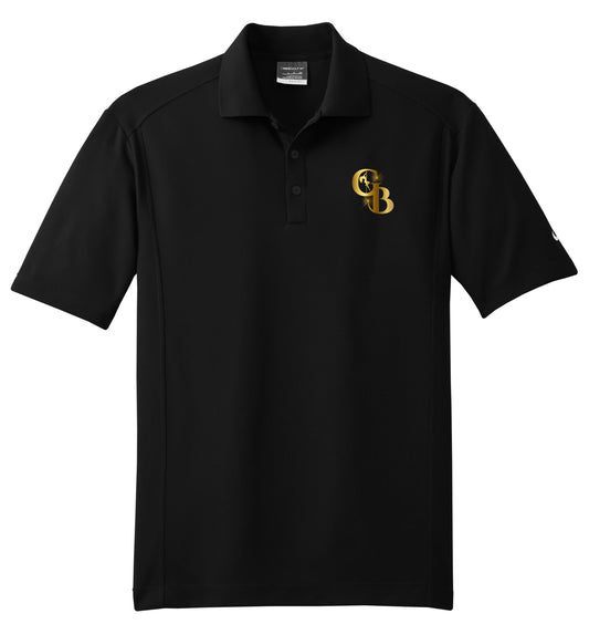 Black Nike Dri-FIT polo with a flat knit collar, three-button placket, and a gold Golden Banana logo on the chest.